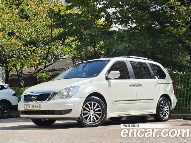Kia Canival 2010 — photo 1