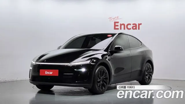 Tesla Model Y 2025 — photo 1