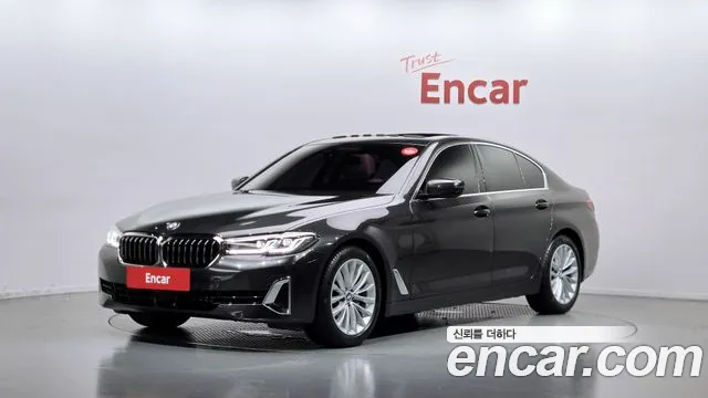 BMW 5-Series 2021 — photo 1