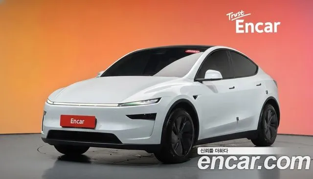Tesla Model Y 2025 — photo 1