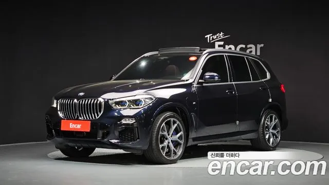 BMW X5 2021 — photo 1