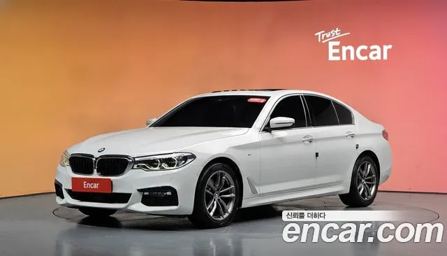 BMW 5-Series 2018 — photo 1