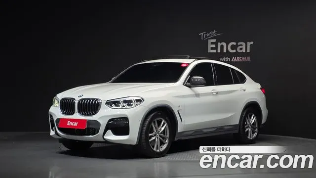 BMW X4 2021 — photo 1