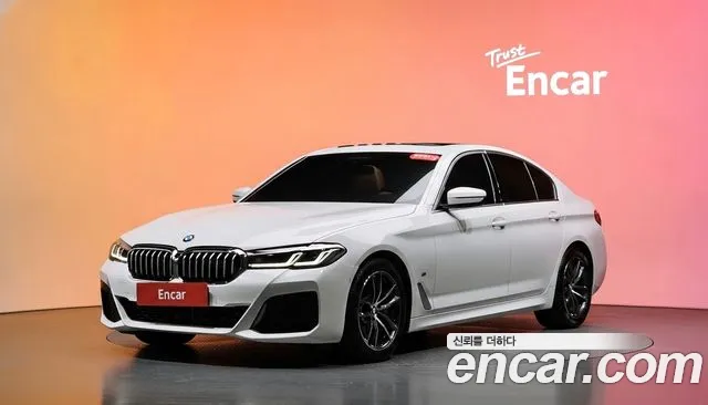 BMW 5-Series 2023 — photo 1