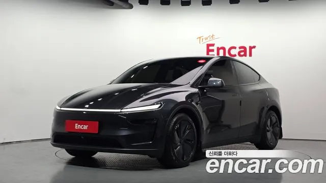 Tesla Model Y 2025 — photo 1