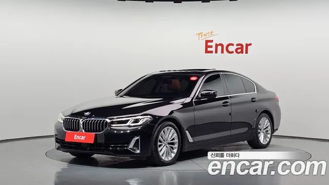 BMW 5-Series 2021 — photo 1