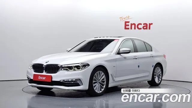 BMW 5-Series 2018 — photo 1