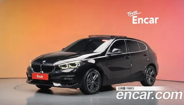 BMW 1-Series 2023 — photo 1