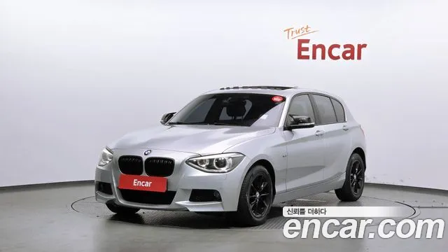 BMW 1-Series 2014 — photo 1