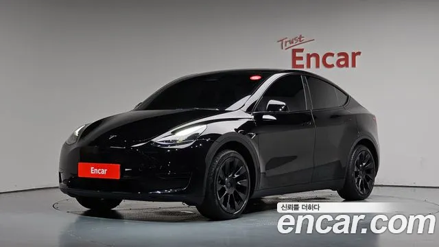 Tesla Model Y 2025 — photo 1