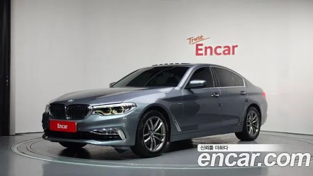 BMW 5-Series 2018 — photo 1