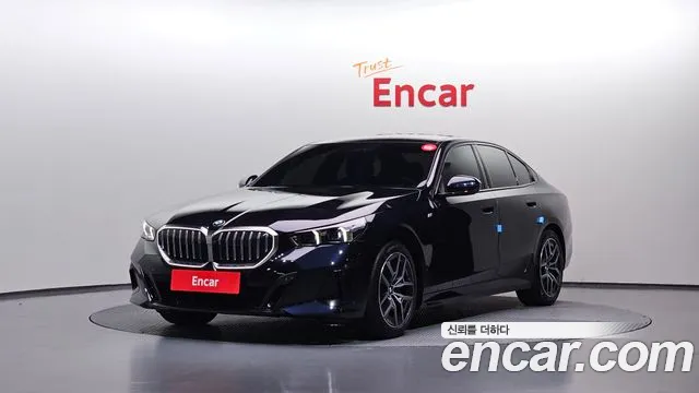 BMW 5-Series 2024 — photo 1