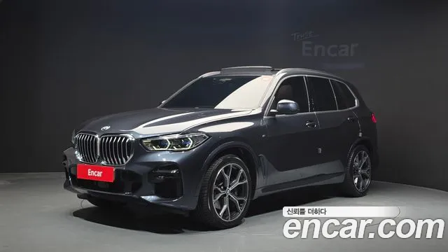 BMW X5 2022 — photo 1