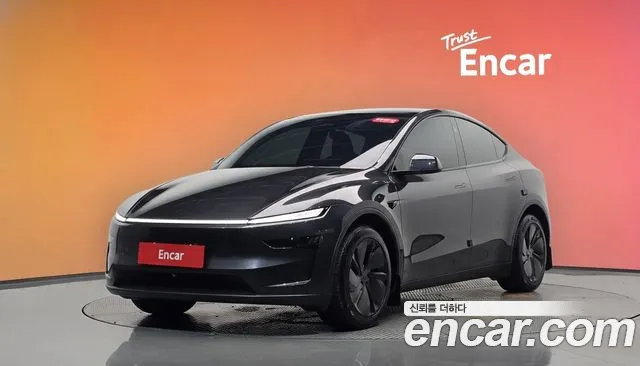Tesla Model Y 2025 — photo 1