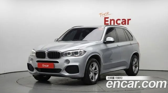 BMW X5 2018 — photo 1
