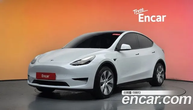 Tesla Model Y 2024 — photo 1