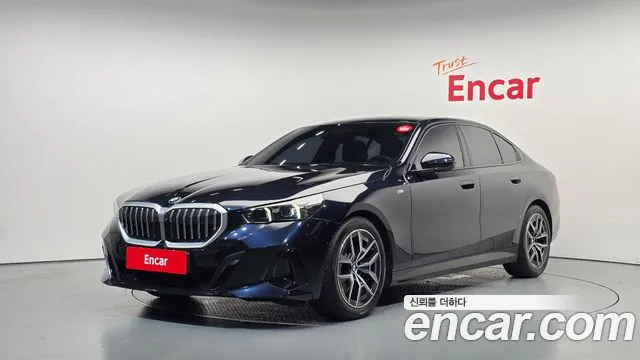BMW 5-Series 2024 — photo 1