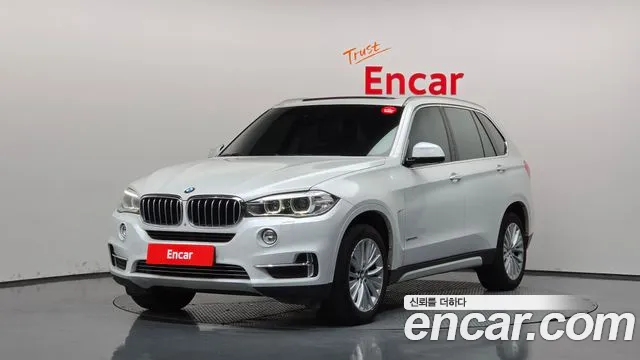 BMW X5 2014 — photo 1