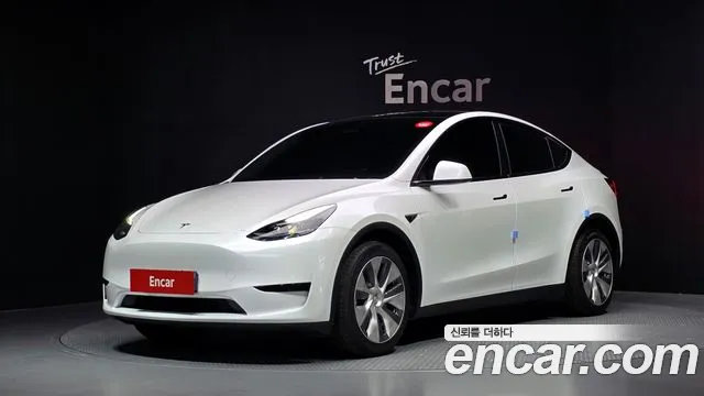 Tesla Model Y 2023 — photo 1