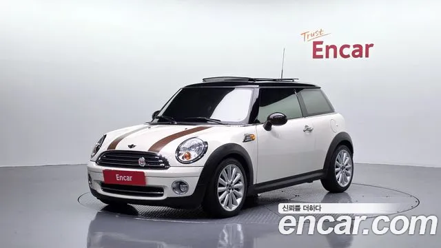 Mini Cooper 2010 — photo 1