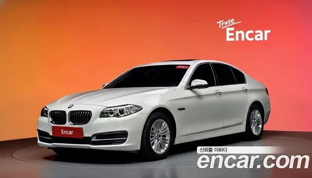 BMW 5-Series 2015 — photo 1