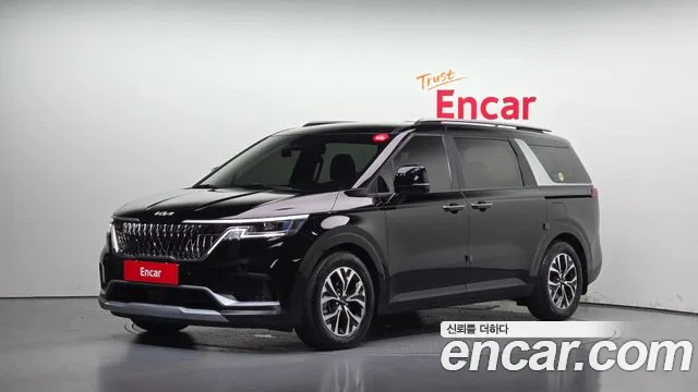 Kia Canival 2023 — photo 1