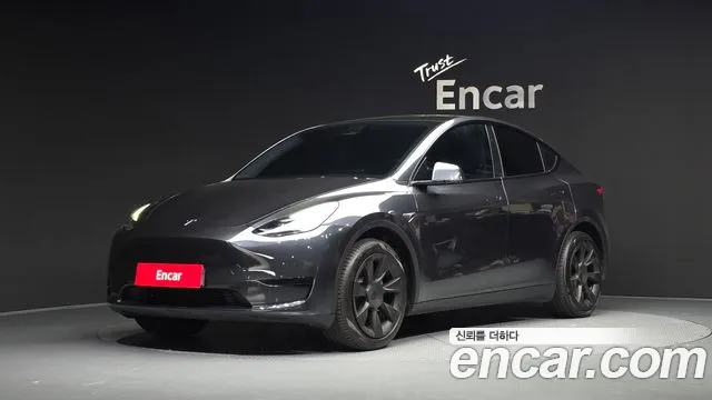 Tesla Model Y 2025 — photo 1