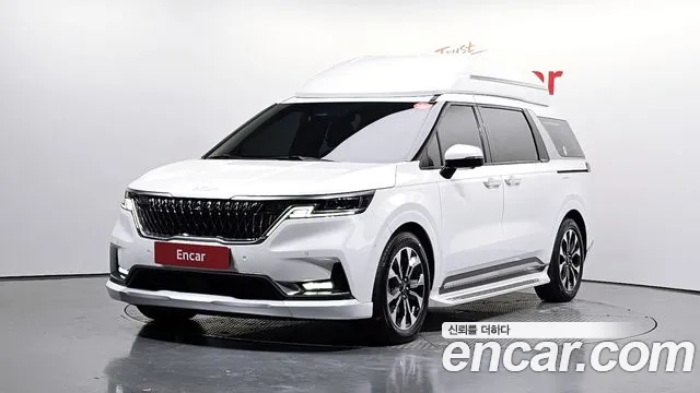 Kia Canival 2023 — photo 1