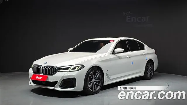 BMW 5-Series 2022 — photo 1