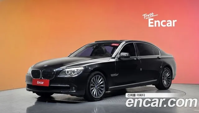 BMW 7-Series 2011 — photo 1