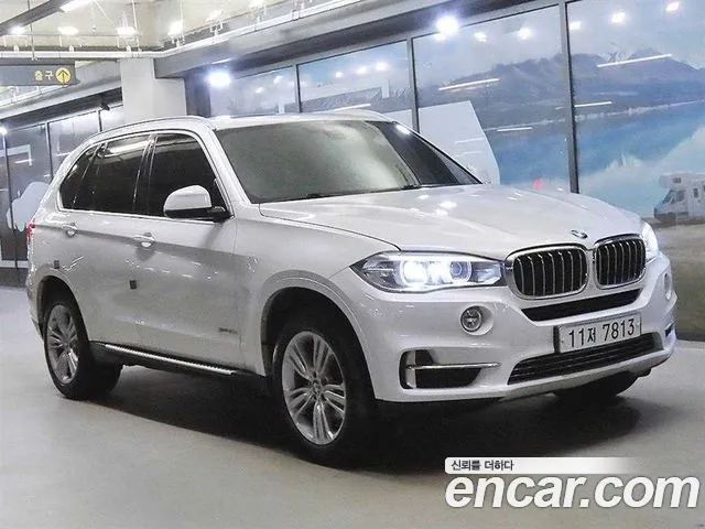 BMW X5 2015 — photo 1