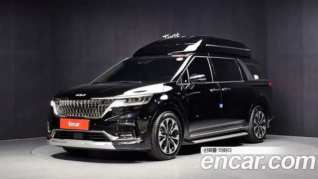 Kia Canival 2023 — photo 1