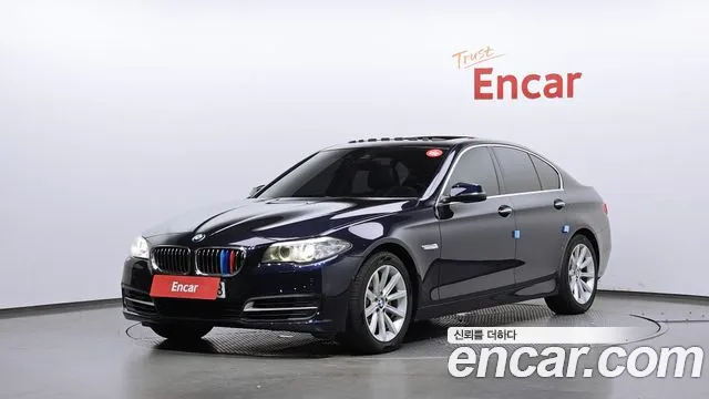 BMW 5-Series 2014 — photo 1