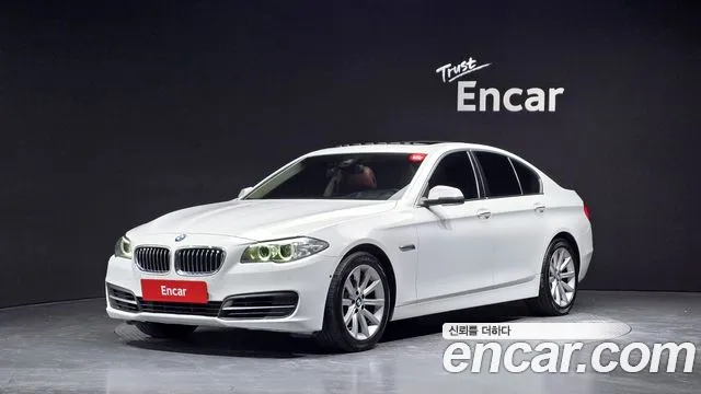 BMW 5-Series 2014 — photo 1