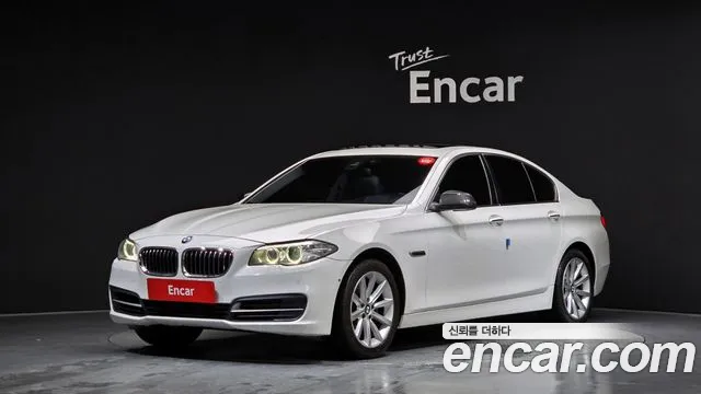 BMW 5-Series 2015 — photo 1