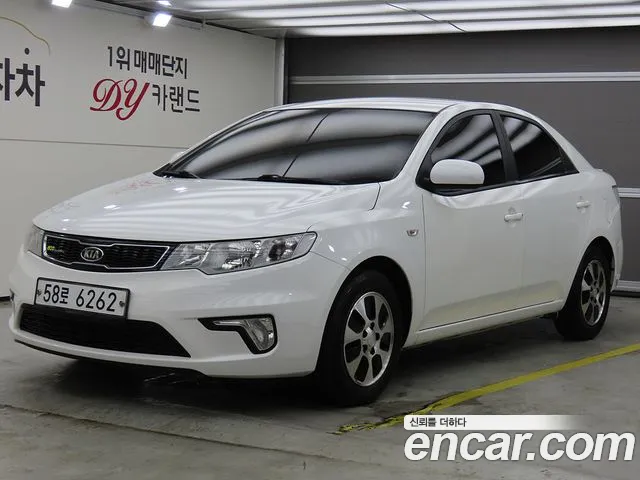 Kia Porte 2013 — photo 1