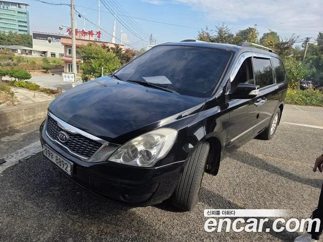 Kia Canival 2011 — photo 1