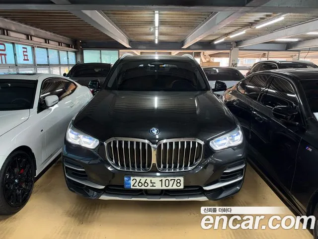 BMW X5 2022 — photo 1