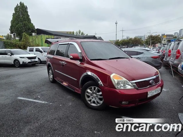Kia Canival 2012 — photo 1