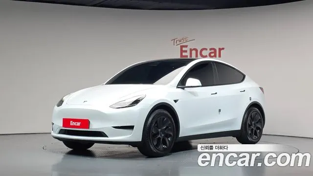 Tesla Model Y 2024 — photo 1