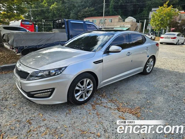 Kia K5 2011 — photo 1