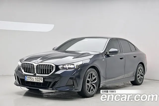 BMW 5-Series 2024 — photo 1