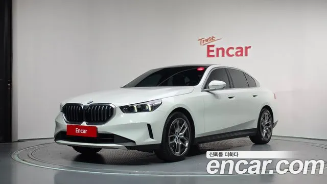 BMW 5-Series 2024 — photo 1