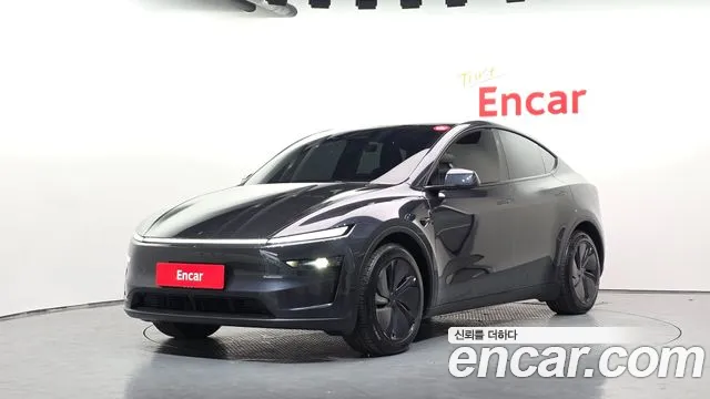 Tesla Model Y 2025 — photo 1