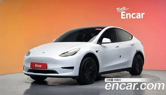Tesla Model Y 2024 — photo 1