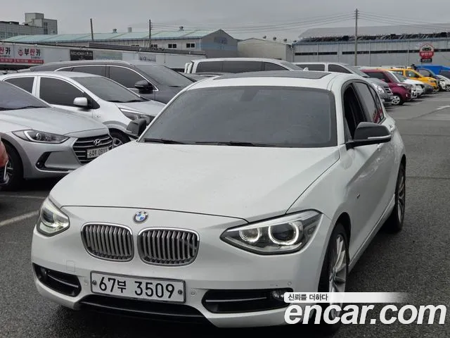 BMW 1-Series 2015 — photo 1