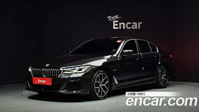 BMW 5-Series 2023 — photo 1