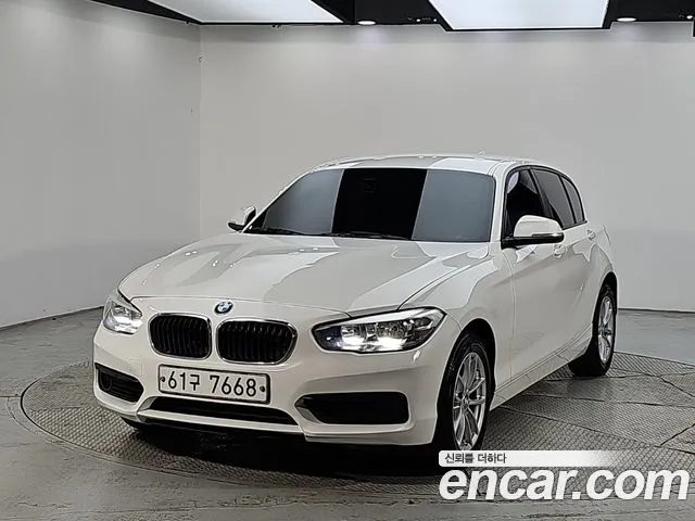 BMW 1-Series 2018 — photo 1