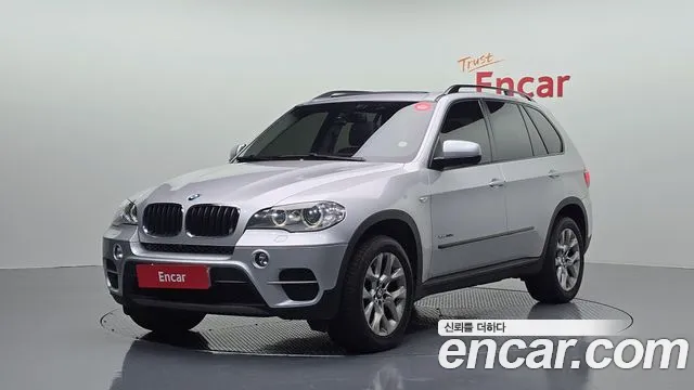 BMW X5 2013 — photo 1