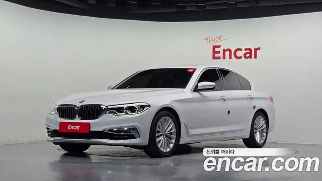 BMW 5-Series 2018 — photo 1
